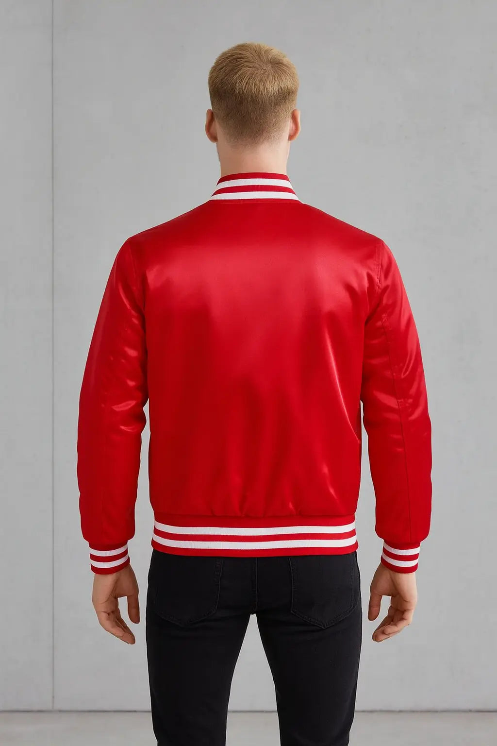 Back view of Mitchell & Ness NBA x Hennessy red satin varsity jacket with striped ribbed hem and cuffs