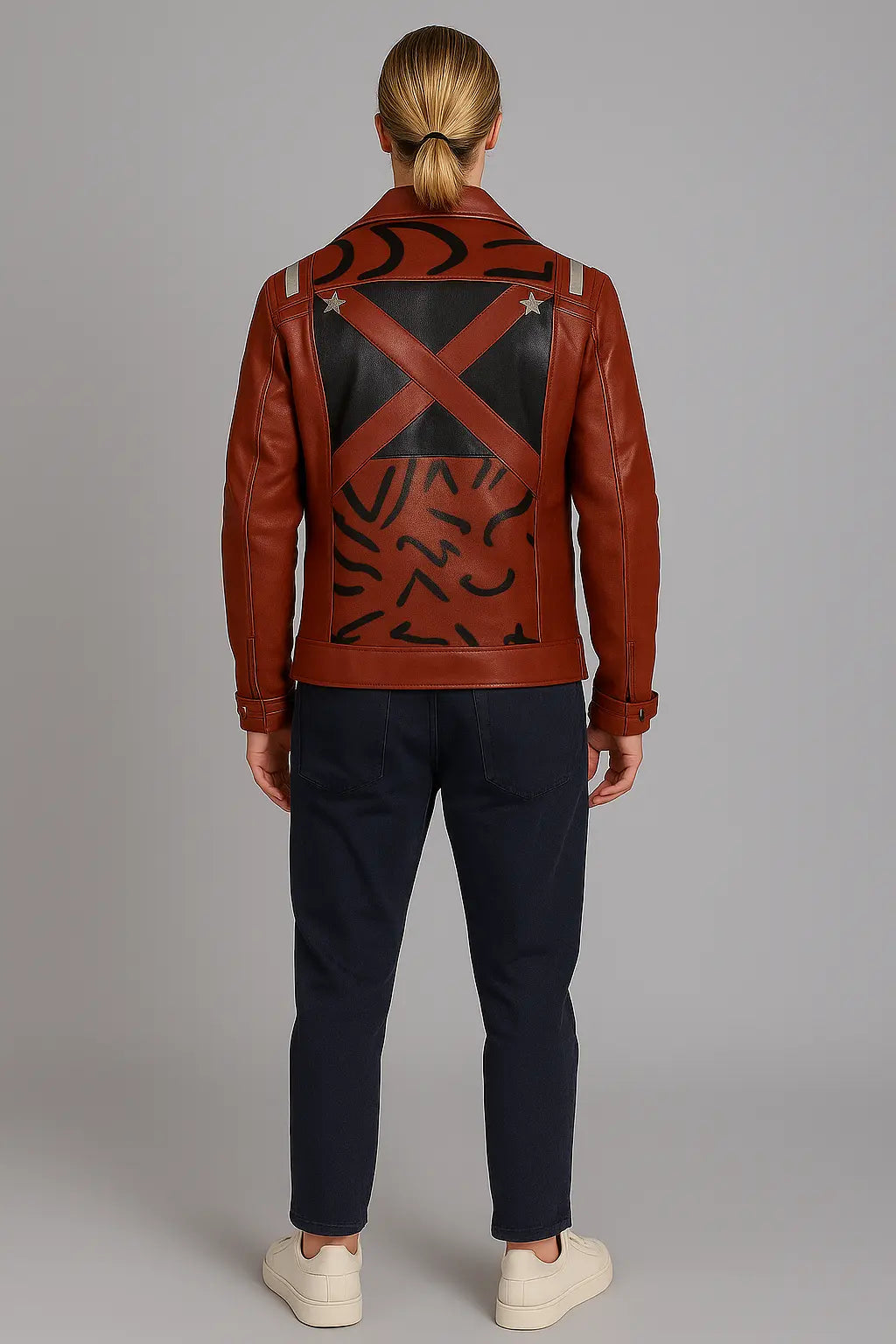 Back view of Travis Touchdown Red Leather Jacket with black graphic accents and cross-strap design
