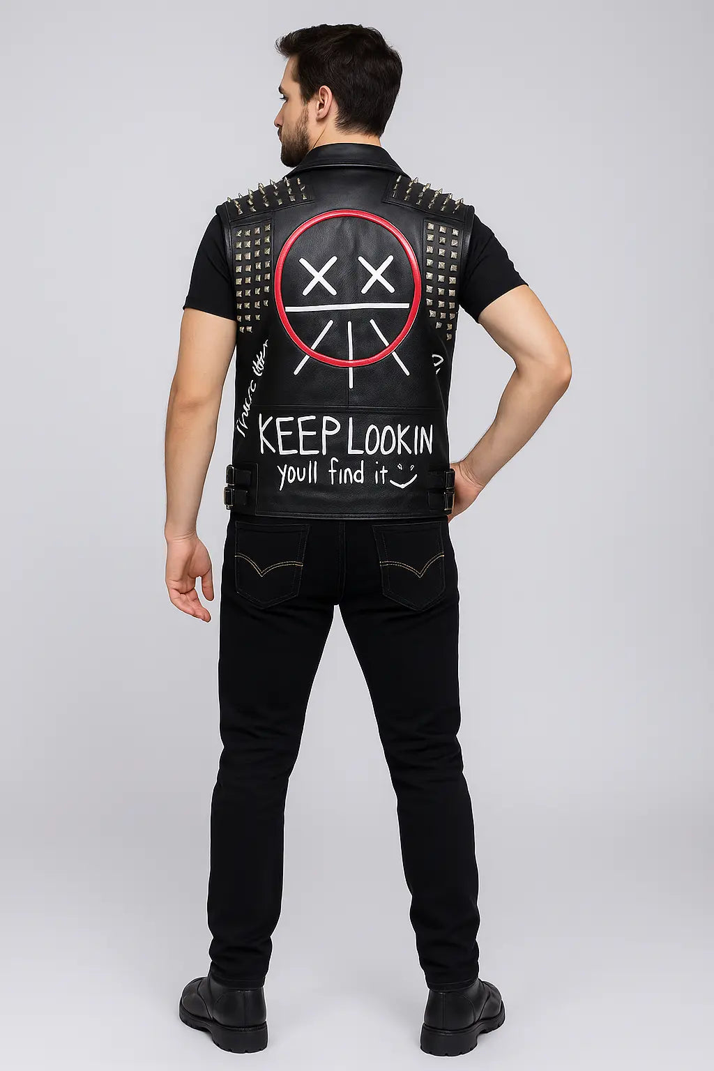 Back view of Watch Dogs Legion Wrench Leather Vest with graffiti artwork and spikes
